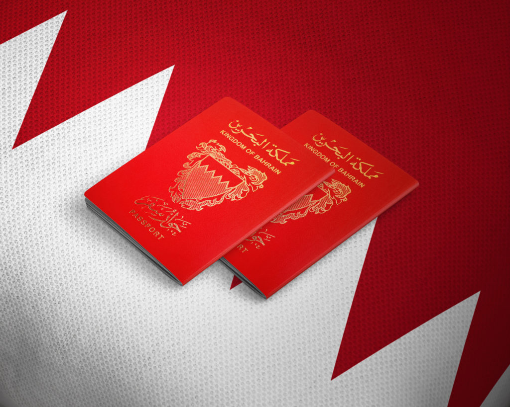 Bahrain passports on the top of  national flag,biometric Bahraini passports. Licensed under Shutterstock.