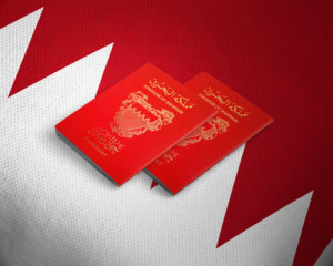 Bahrain passports on the top of  national flag,biometric Bahraini passports. Licensed under Shutterstock.